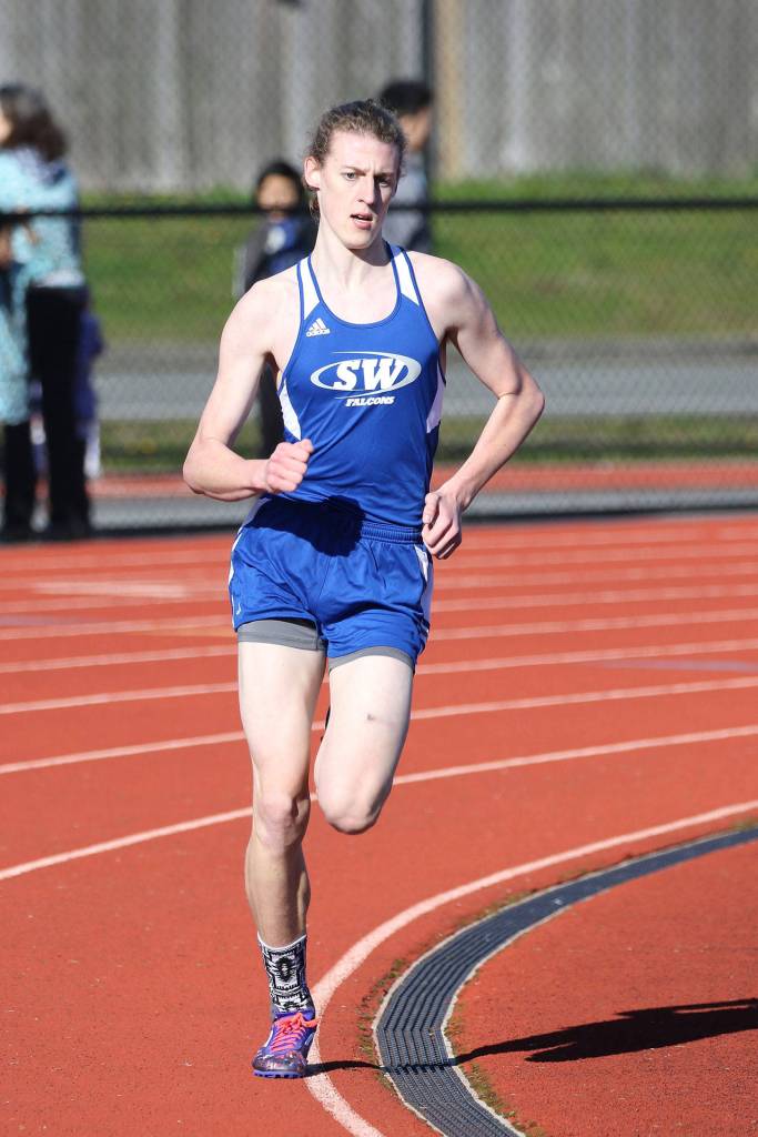 Callahan Yale runs the 1,600 for the Falcons at the jamboree.(Photo by John Fisken)