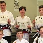 8 receive junior black belts / Martial arts