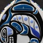 This piece, called Nanooks Orca Guitar, is comprised entirely of fused glass Gina Michel cut and layered to give it a three-dimensional look.