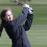 Alyssa Ludtke follows her shot during Tuesdays tournament in Oak Harbor.(Photo by John Fisken)