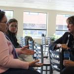WhidbeyHealth CEO Geri Forbes speaks with Manette Merrill following Wednesdays public hearing explaining the health systems need for a $20 million low-interest federal loan.
