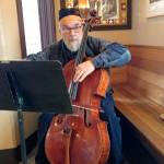Photo by Drew Kampion                                Buell Neidlinger played the cello on Whidbey Island in recent years, but he was famous for his bass playing. He passed away March 16.