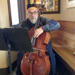 Photo by Drew Kampion                                Buell Neidlinger played the cello on Whidbey Island in recent years, but he was famous for his bass playing. He passed away March 16.