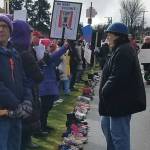 Empty shoes for kids gone to guns