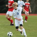 Thomas Simms looks to advance the ball for South Whidbey.(Photo by Jim Waller/Whidbey News Group)