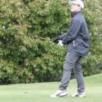 Noah Ratcliff follows the flight of his drive.(Photo by Jim Waller/Whidbey News Group)