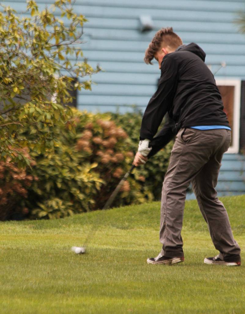 Dane Saxton tees off for the Falcons.(Photo by Jim Waller/Whidbey News Group)