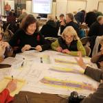 Langley residents look over different proposals for reconfigured parking along First Street at a public forum Wednesday night. Photos by Patricia Guthrie/Whidbey News Group