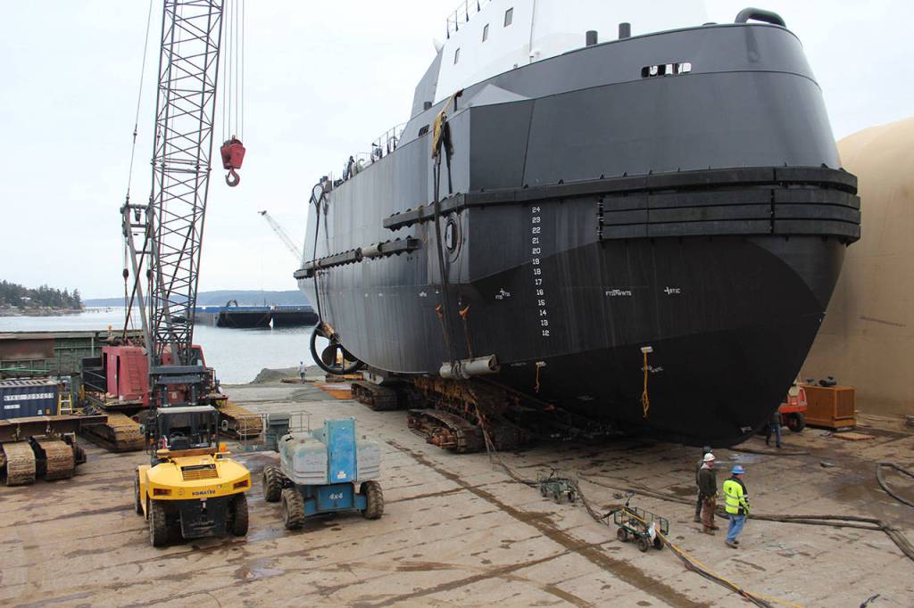 Crawlers placed under the vessel slowly roll it forward to the shore. Frank Nichols, founder of the company, invented the crawlers, his son, Matt Nichols said.