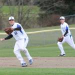 Third baseman Cameron Middlebrook sets up to throw across the diamond as shortstop Ethan Petty backs up the play.(Photo by Jim Waller/Whidbey News Group)