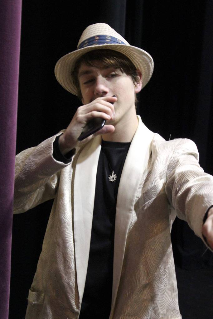 Arlen E. Rankin impersonates singer Tom Jones in South Whidbey High Schools production of Just Another High School Play.