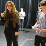 Actors quickly change roles, including for this scene from Shakespeares most famous romantic tale, Romeo and Juliet. Fiona Roberts practices her role of Juliet with her Romeo, Caleb McArthur. The production, Just Another High School Play, opens April 12.