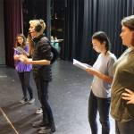 Students putting on a play in Just Another High School Play never came to rehearsal so the director abandons them opening night. Isaiah Giffin, wearing head phones as the stage manager, calls for improvisation. Jasmin Graner, far left, along with Marla Kelly and Jessica Hodson, far right, listen in. Photos by Patricia Guthrie/Whidbey News Group