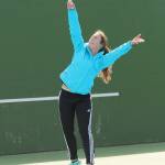 Farris Jokinen serves during her first singles win Thursday. (Photo by Jim Waller/Whidbey News Group)