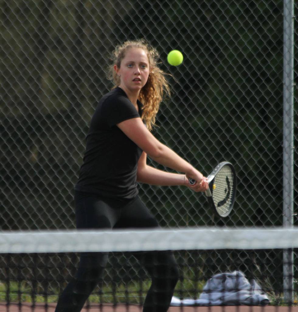Ally Lynch focuses on a return shot. (Photo by Jim Waller/Whidbey News Group)