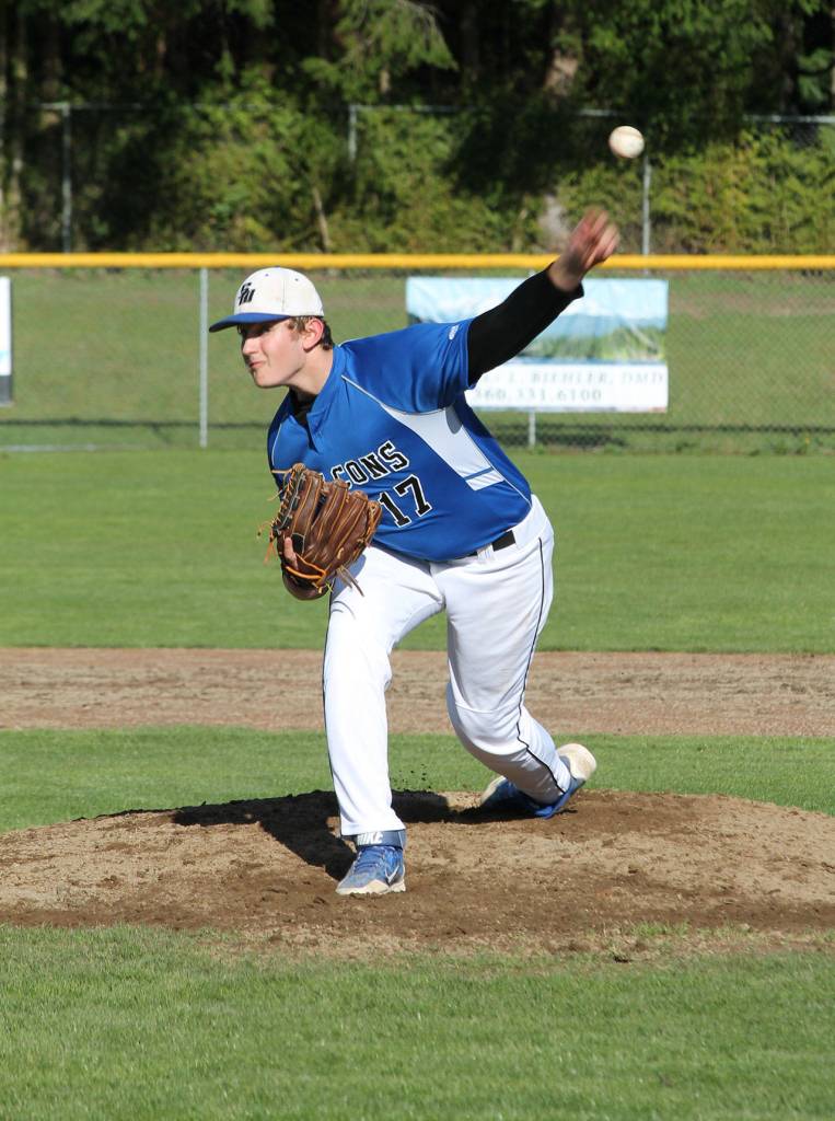 Brent Batchelor fires a pitch in Thursdays game with Cedarcrest. (Photo by Jim Waller/Whidbey News Group)