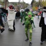Welcome the Whales Parade and Festival Saturday in Langley featured lots of kids in brightly-colored critter costumes with many adults joining in the annual tradition, including Gail Fleming who likes to wear a frog suit. Photo by Patricia Guthrie/Whidbey News Group