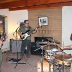 Photo by Joseph Savidge for the South Whidbey Record                                Lead singer and bass guitarist Donald Singleton (center), drummer Randy Wolfe and guitarist Max LeMay of the band Mylo practice for upcoming performances.