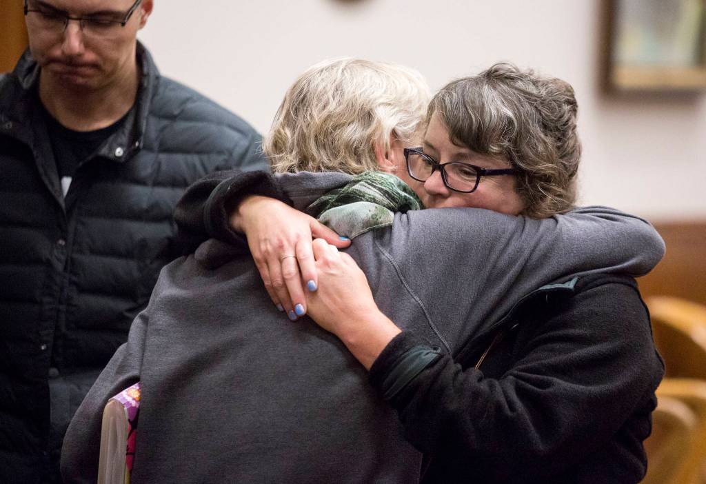 Andy Bronson / The Herald                                Tiffany Ferrians (right) hugs Tamara Fralic after two former Island County corrections officers, Mark Moffit and David Lind, were sentenced at Whatcom County Courthouse in the death of Keaton Farris on Tuesday in Bellingham. Ferrians is Farris mother. Fralic is Farris aunt.