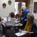 Whidbey Island Sketchers meet every Friday and sketch a variety of indoor locations, such as businesses, art shows and other interesting venues. When the weather gets nicer, they take their craft outdoors. No matter where they land, its always followed by wine time. Ask anyone, its a great group, says Barbara Barry, seated.