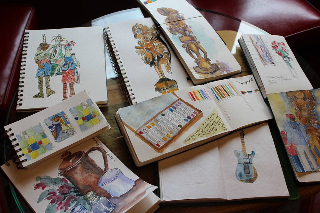 Whidbey Island Sketchers often show their work to one another with a throwdown over a glass of wine or two.