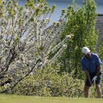 Geary Milligan and two friends reveled in a rare April sunny day at Holmes Harbor Golf Course Thursday. The public golf course is trying to improve its sand bunkers and greens through sponsorship programs. Photo by Patricia Guthrie/Whidbey News Group