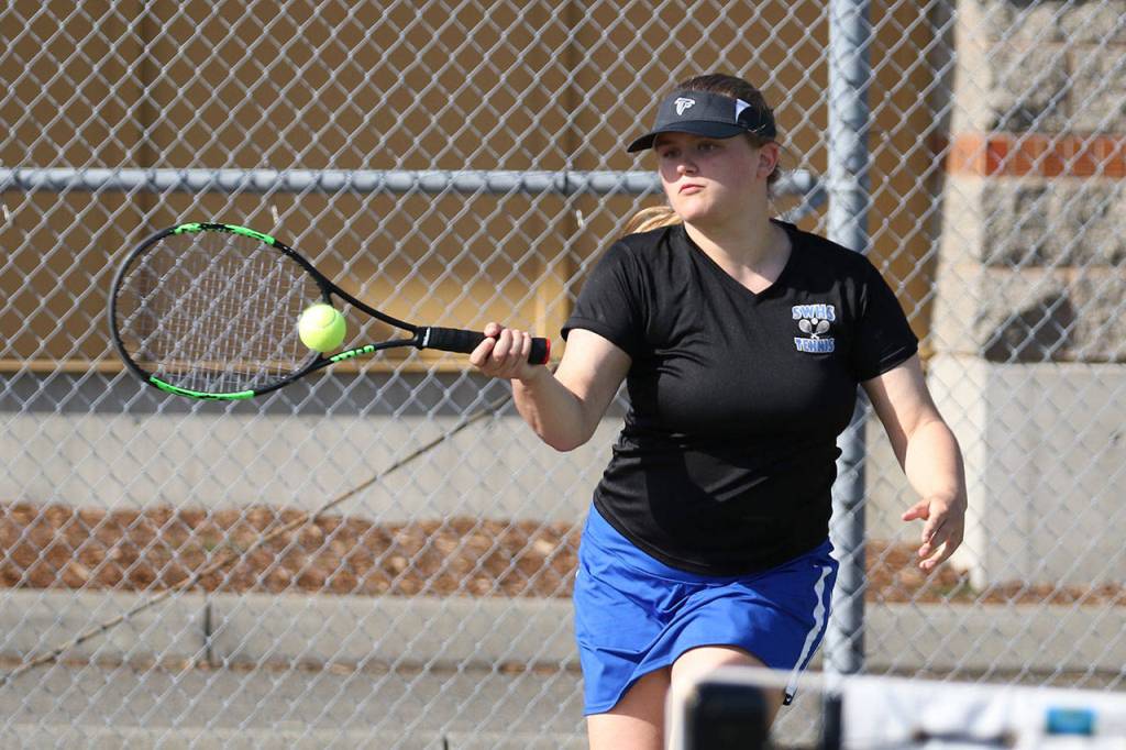 South Whidbeys Oliana Stange helps her team defeat Coupeville, which is coached by her father Ken Stange.(Photo by John Fisken)