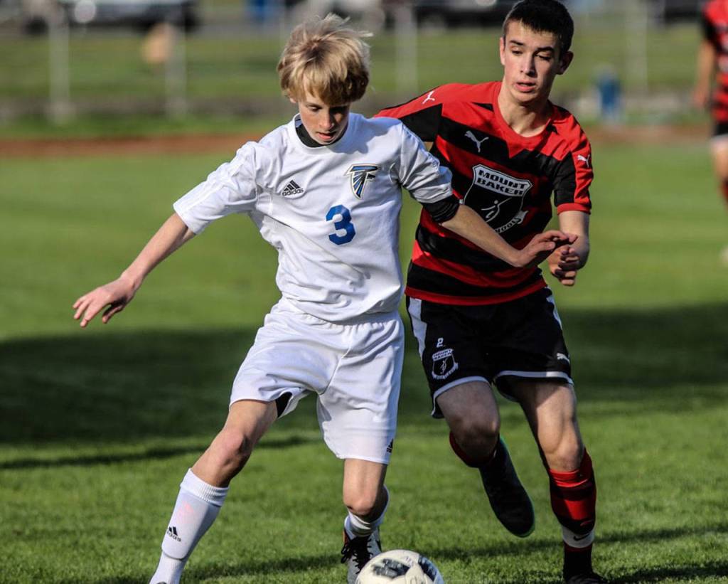 Thomas Simms fights for possession Mondays match.(Photo by Matt Simms)