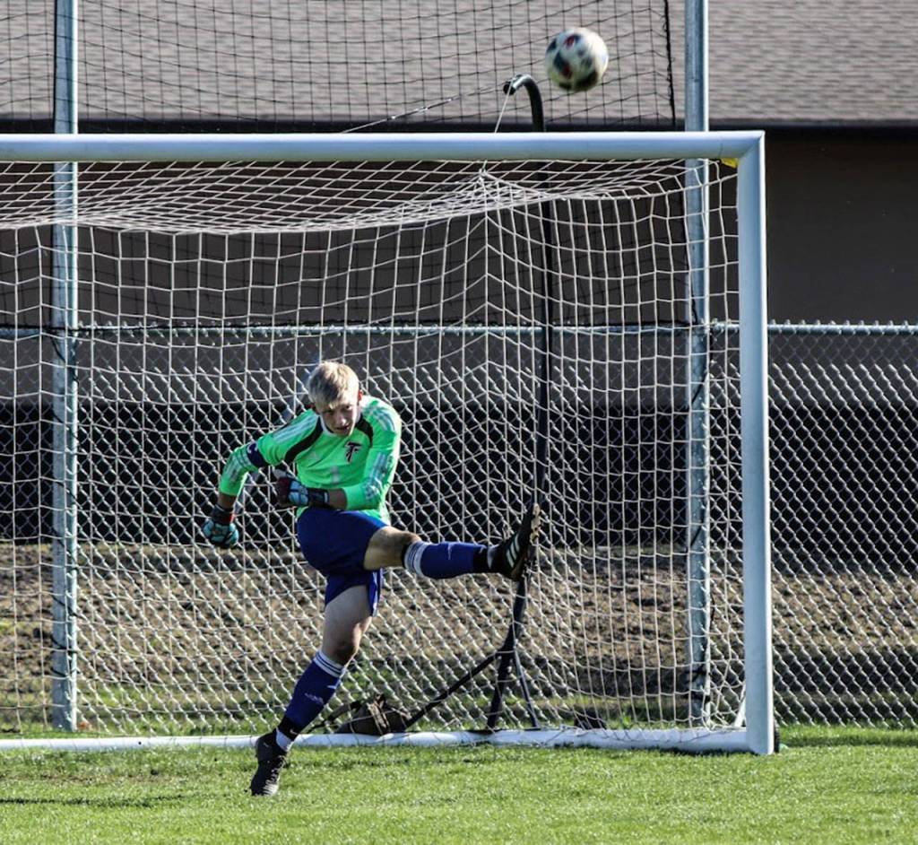 South Whidbey keeper Julian Inches puts the ball in play.(Photo by Matt Simms)