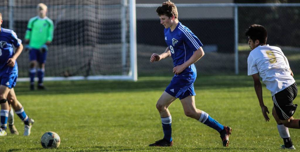 Falcon Ari Rohan hustles to the ball in Wednesdays match.(Photo by Matt Simms)