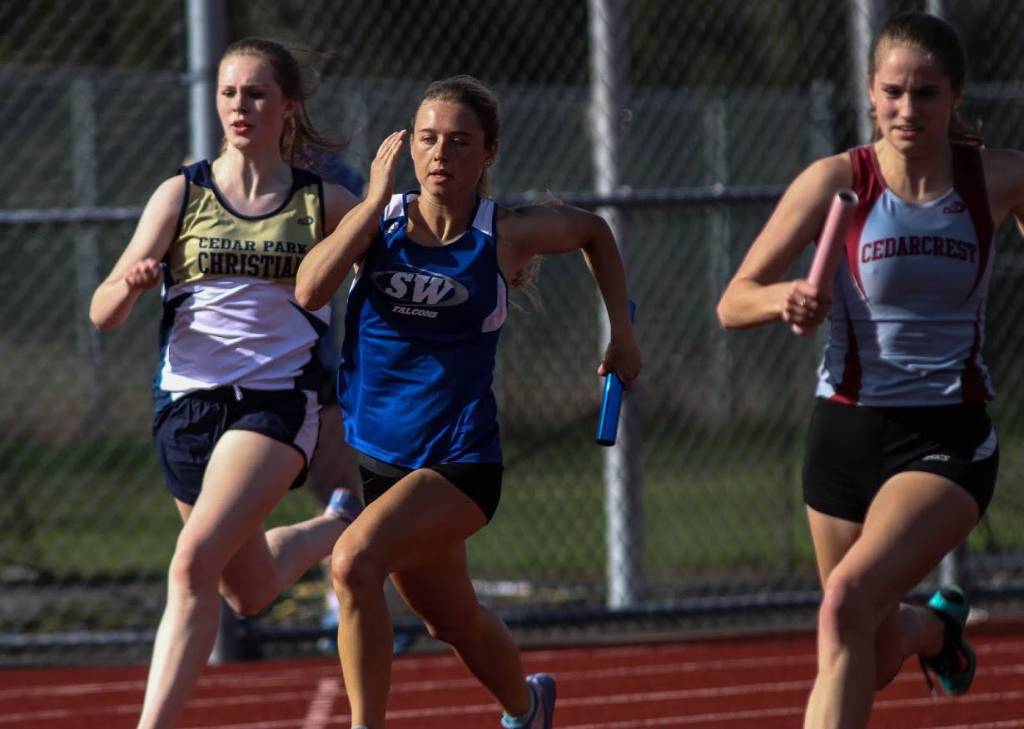 Alex Kurtz runs in the 4x200 relay for South Whidbey.(Photo by Matt Simms)
