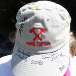 Every year, Ashley McConnaughey has fellow volunteers sign her Hearts & Hammers House Captain hat. More than 400 people volunteered on Saturday and many attended that evenings 25th anniversary celebration dinner.