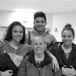 Photo by Lenora Eckert                                Hometown hero Lewis Pope, in back, is pictured with, from left, sister Samantha Pope, mom Teresa and sister Taylor Pope.