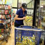 Goose Community Grocer employee Kayla Leganza takes inventory of frozen food Monday. The Langley store is forced to dump its entire refrigerated and frozen inventory after the main cooling system failed over the weekend. Photo by Patricia Guthrie/Whidbey News Group