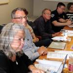 Listening during public comment at a Langley City Council meeting are, left to right, Finance director Debbie Mahler, Mayor Tim Callison, Planning director Brigid Reynolds, Public Works director Stan Berryman, Chief of Police David Marks and his friend Tara Hoflack. Photo by Patricia Guthrie/Whidbey News Group