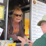 Owner Heather Koch makes change for Perry Lovelace. She said shes happy to be back among happy customers instead of the angry one she encounters around town when she shuts down for the winter.