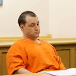 Photo by Jessie Stensland / Whidbey News Group                                Convicted murderer Joshua Lambert appears bored during a hearing last Friday on a series of his motions. He is acting as his own attorney.