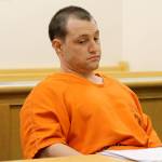 Photo by Jessie Stensland / Whidbey News Group                                Convicted murderer Joshua Lambert appears bored during a hearing last Friday on a series of his motions. He is acting as his own attorney.