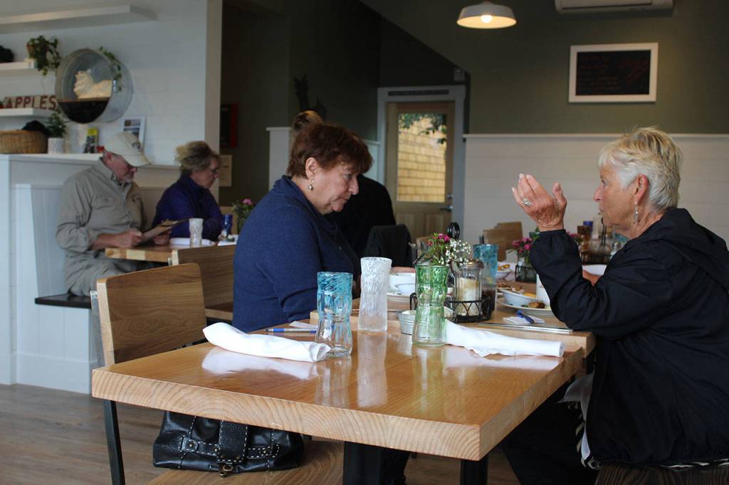 Friends Diahn Stetner (left) and Pam Carroll ate breakfast at Braeburn for the first time since it reopened. Before it had a homegrown, a little bit funky feel, said Stetner, and now its unique, very fresh and very different. Added Carroll: Its absolutely beautiful.