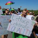 Participants with food bank Good Cheer marched with some clever, farm fresh messages. Photos by Patricia Guthrie/Whidbey News Group
