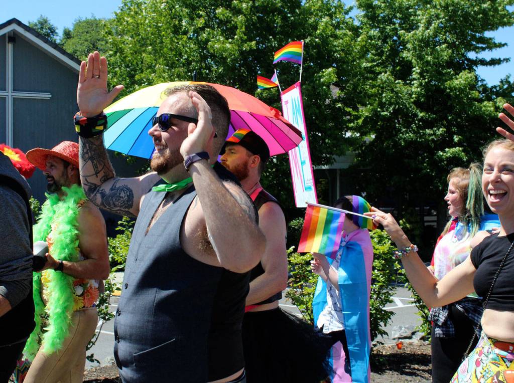 Parade organizer Skye Newkirk encourages people to keep cheering and dancing toward the end of the fifth annual Queer Pride Parade.