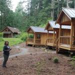 Holly Harlan, program director at Whidbey Institute, talks about how new cabins will help the retreat learning center bring in needed income.Photo by Patricia Guthrie/Whidbey News Group