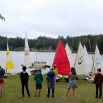 Students in a recent beginning sailing class on Deer Lake line up to play a game that teaches balance. They spend a couple hours each day in the little wooden El Toros 8-foot boats learning the ropes and how to read wind and current. Classes are taught by the South Whidbey Yacht Club through South Whidbey Parks and Recreation.