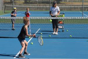 Foode leads kids in Parks and Rec tennis camp