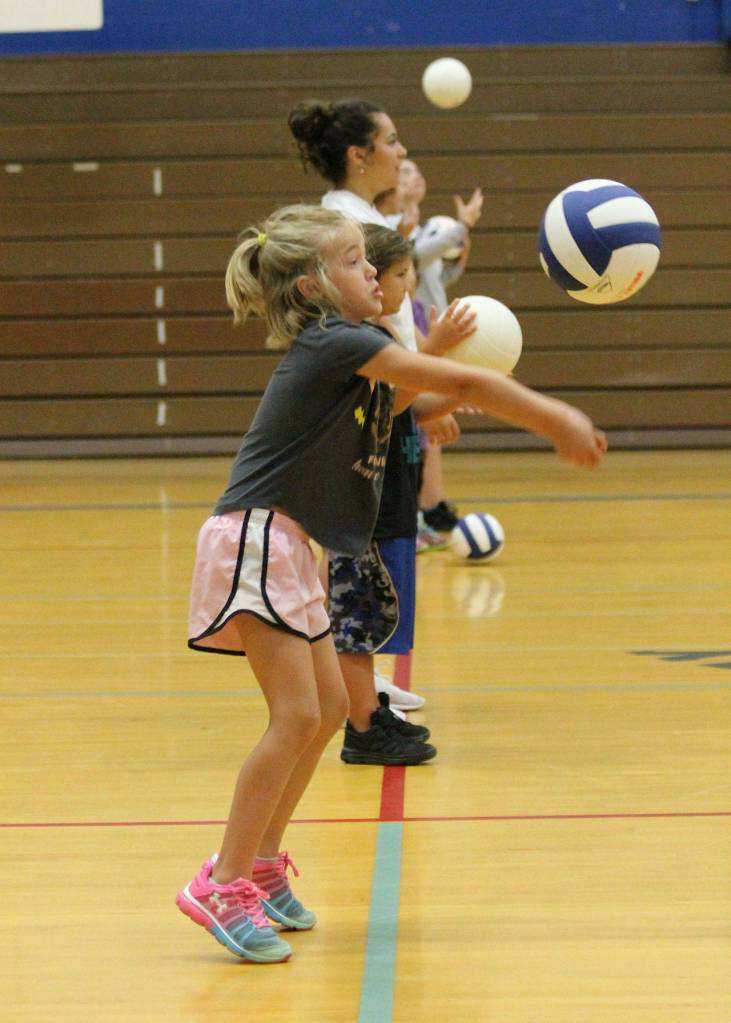 Sawyer Dill, front, and her fellow campers go through a passing drill.(Photo by Jim Waller/South Whidbey Record)