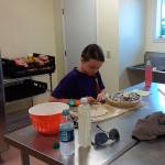 Madison Thompson used the Coffman Kitchen Saturday to make blackberry pie for the 4-H pie baking contest during the recent Whidbey Island Fair. Photo provided
