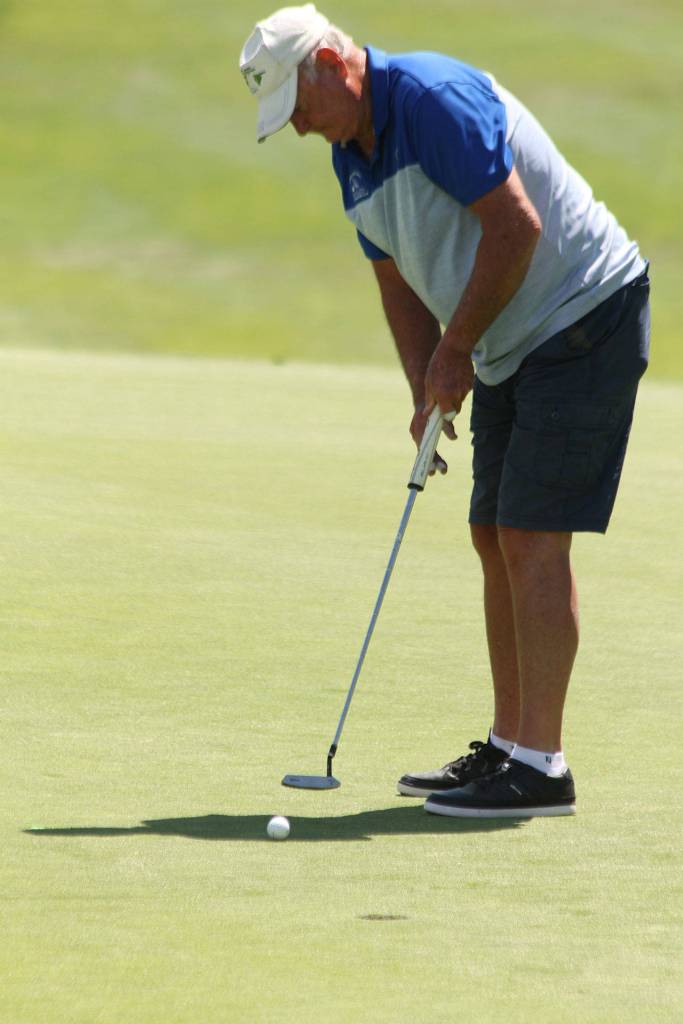 Byron Vadset seeks to sink a putt.(Photo by Jim Waller/South Whidbey Record)