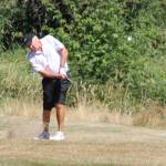 Don Kirkland chips to the green.(Photo by Jim Waller/South Whidbey Record)