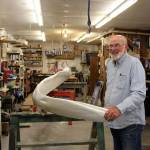 Woodworker Ken Price spent months restoring the jaw bone of a blue whale that had deteriorated outside Langelys Whale Center. Hes been working on it since December. The giant jaw bone is scheduled to be returned to the Whale Center Wednesday. Photo by Patricia Guthrie/Whidbey News Group