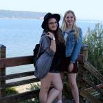 Kelaynna Kikkert, right, and her friend, Marisa Quagla, from British Columbia, strike a scenic photo pose above the Saratoga Passage during a day trip to Langley.